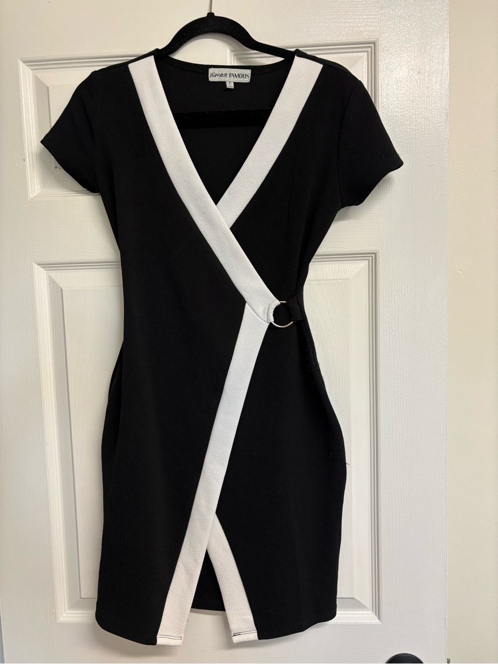 Almost Famous Black Dress with White Accents and Silver Ring at the Waistline